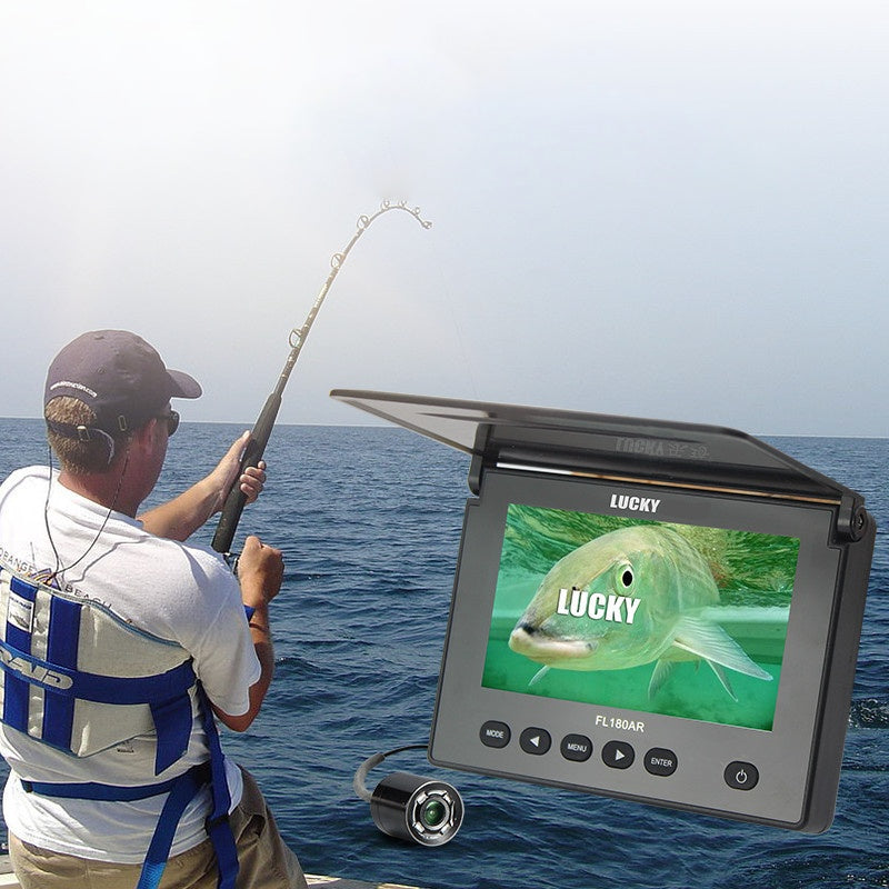 Angler using HD underwater fish finder camera with LCD display for sea fishing
